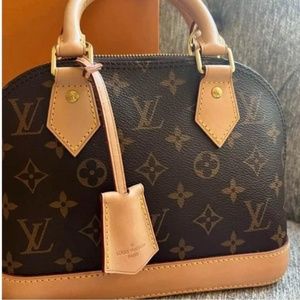Authentic Louis Vuitton Alma BB bag